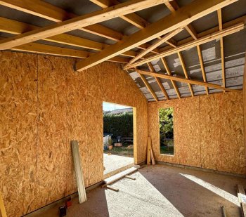 Intégration architecturale bois sur maison traditionnelle